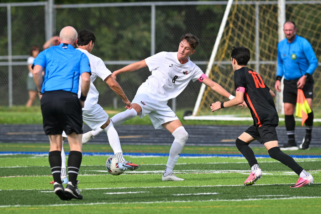 Watterson's Sam Meacham battles for ball