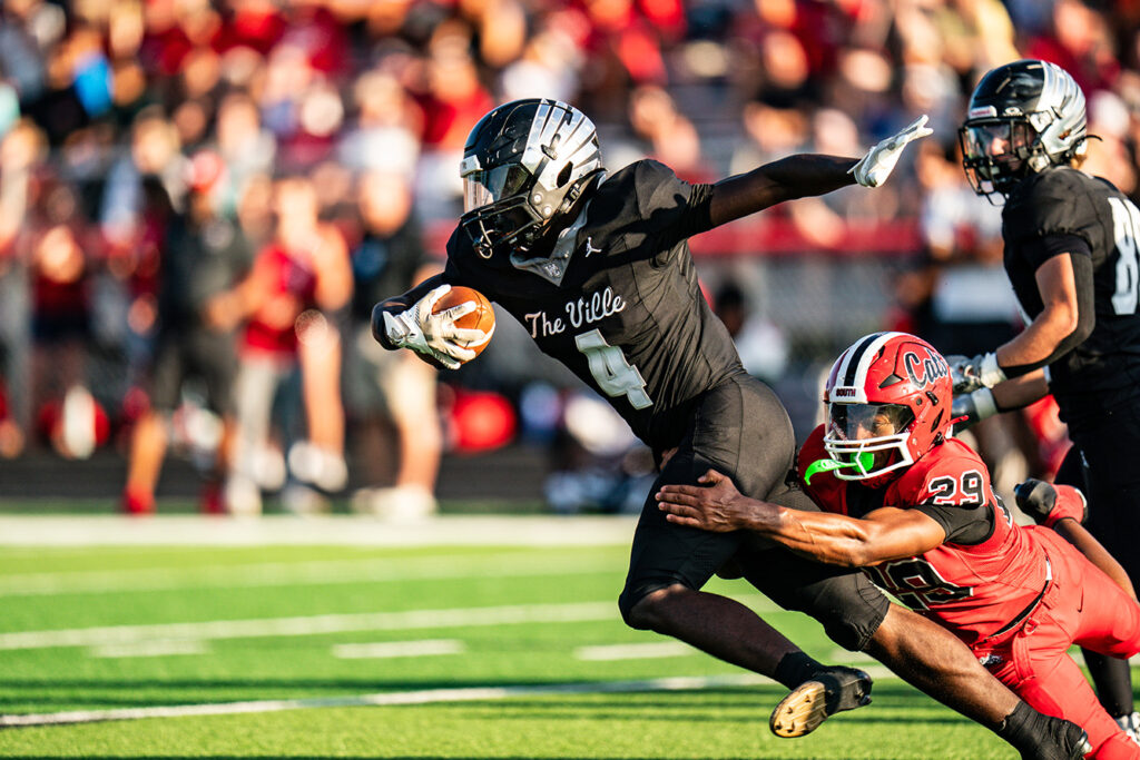 Westerville Central's Kevinking Fokuo runs ball