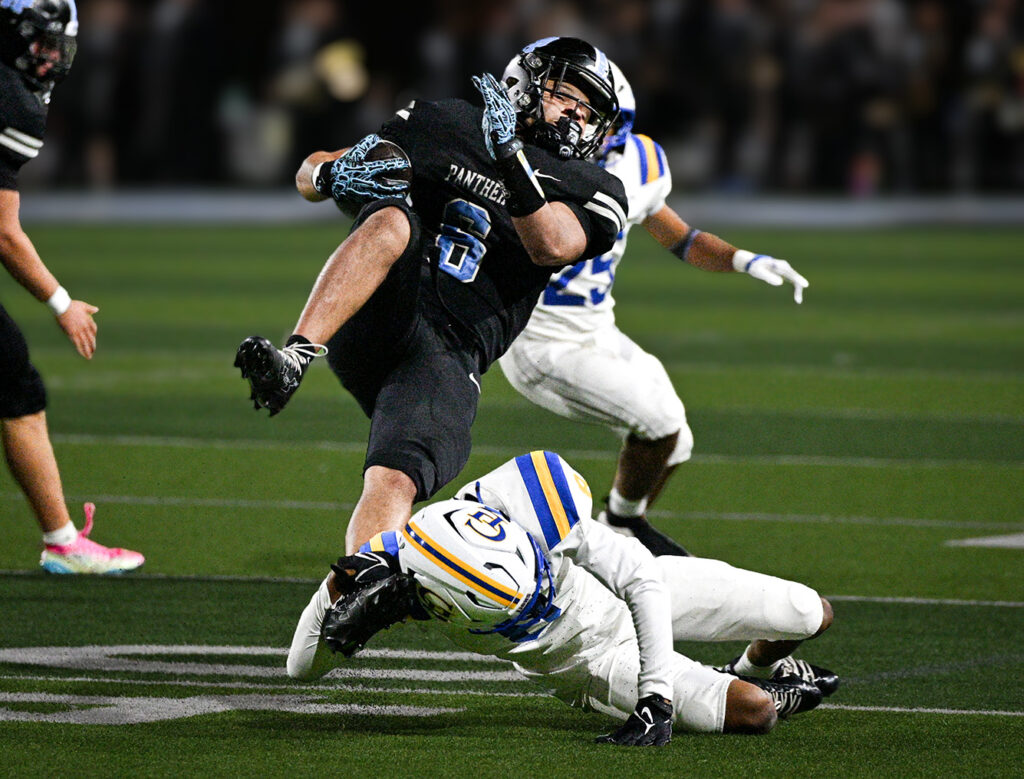 Darby's Kohen Kornegay tackled rushing the ball