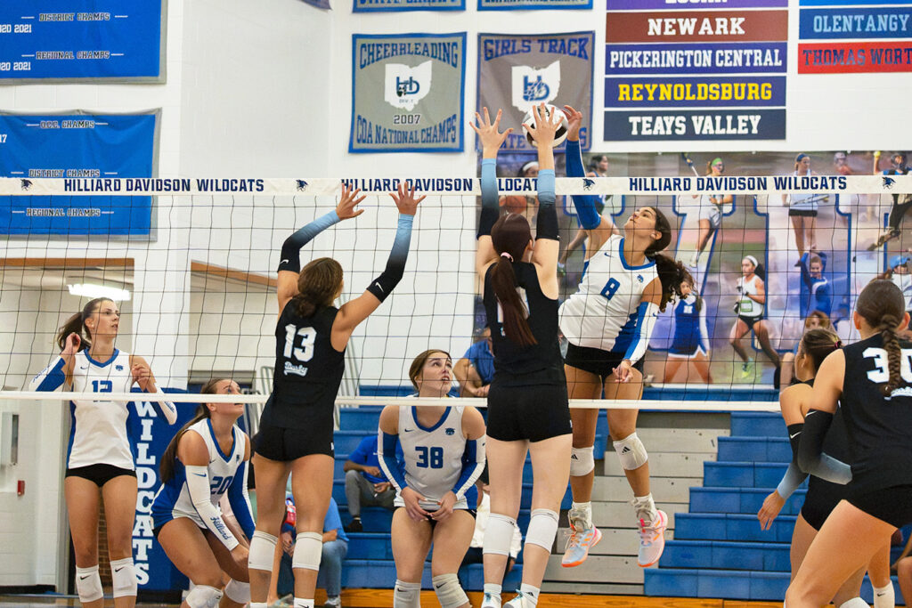 Davidson's Avery Asp hits at net