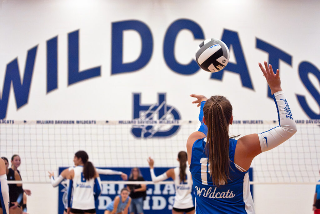 Hilliard Davidson's Sophie Smith serves volleyball