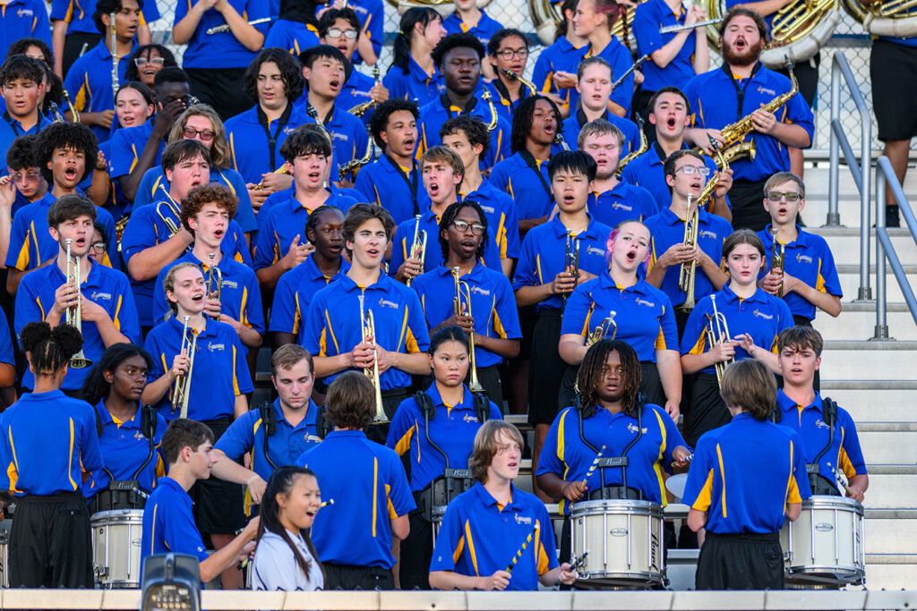 Gahanna band singing in stands