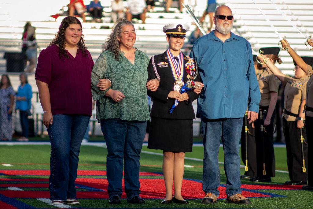 A member of the ROTC is recognized before Grove City football game