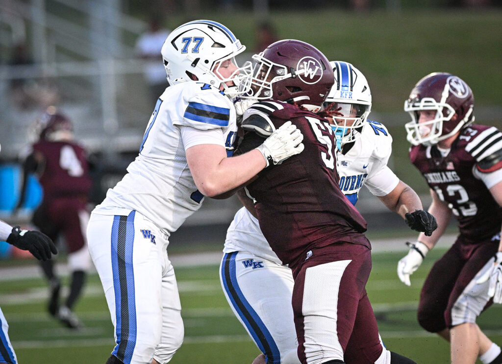 Linemen facemask to facemask in pass protection