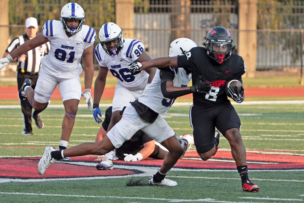 Ohio Wesleyan's Gio Rufus runs ball