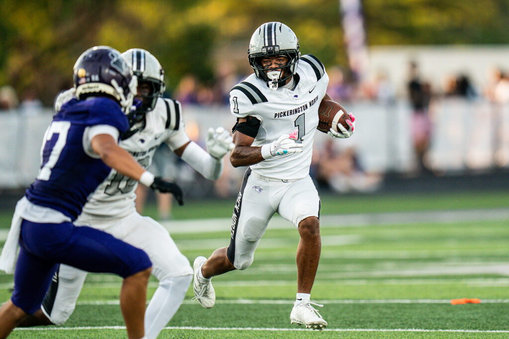 PIckerington North's Geo McKnight runs
