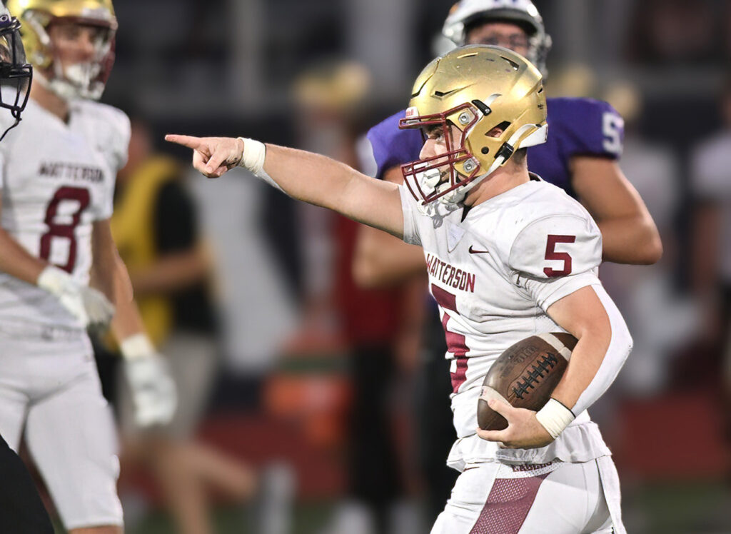 Watterson's Caen Mangini indicates an Eagles' first down