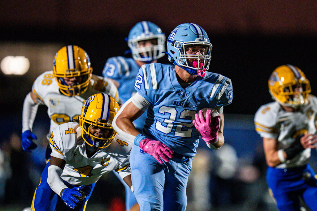 Berlin's Owen Miller runs ball