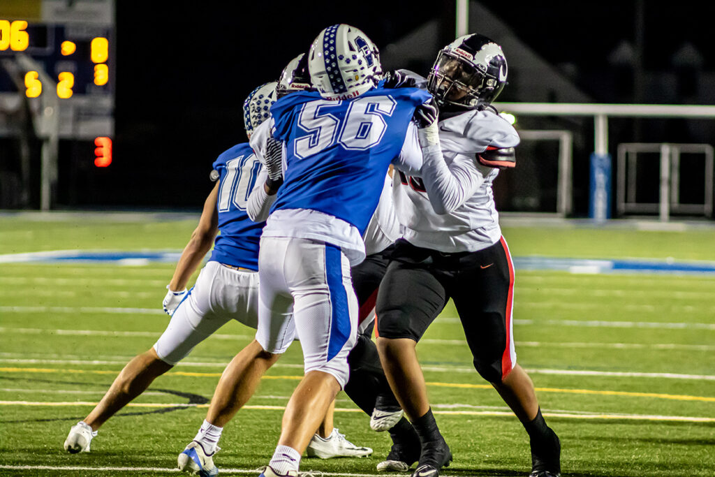 Bexley's Thomas Helvie blocks