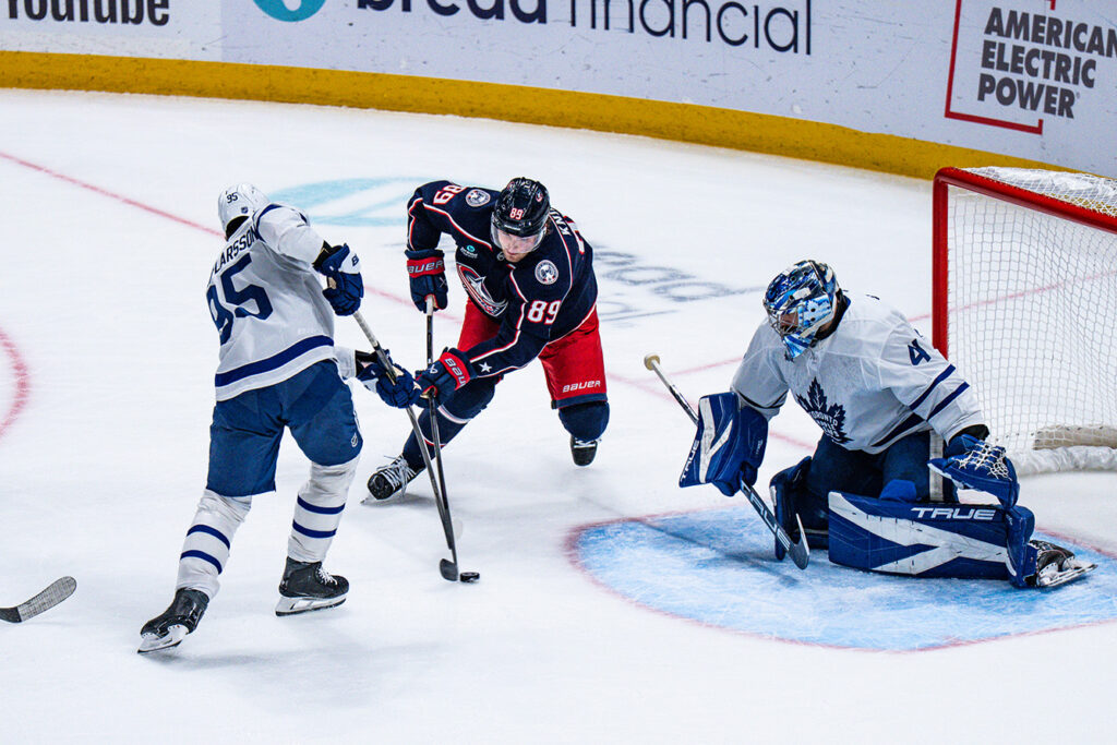 CBJ's Matthew Knies battles at net