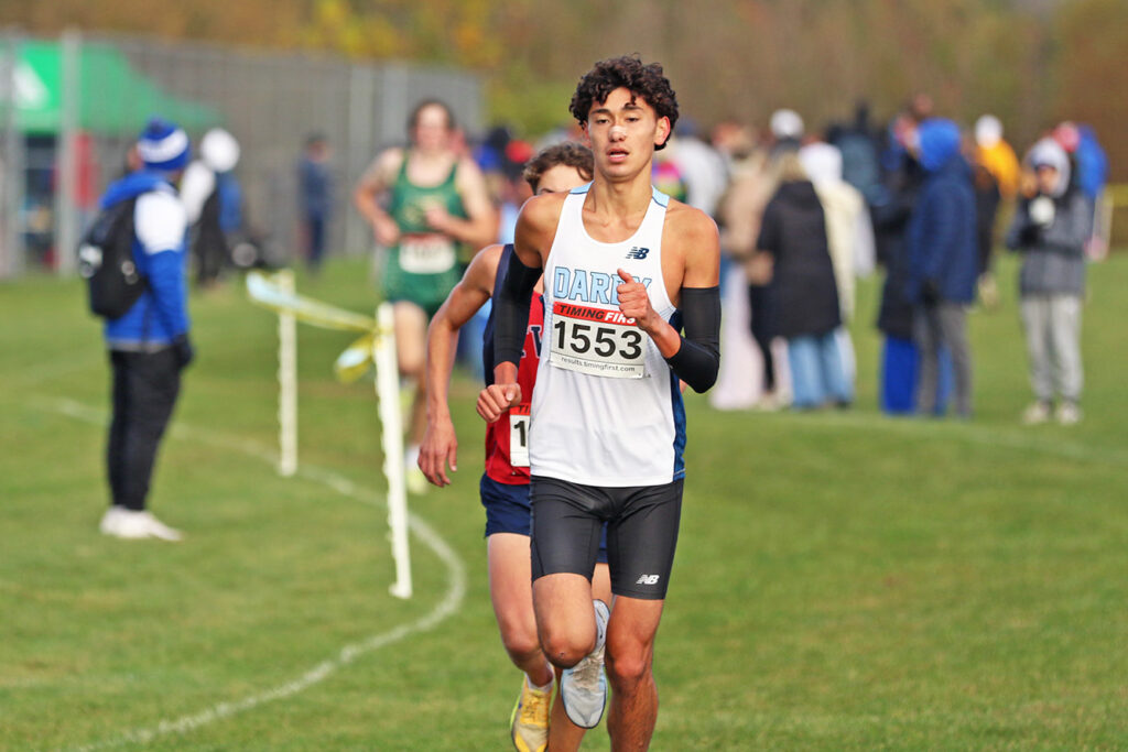 Darby's Logan Behm heads to the finish