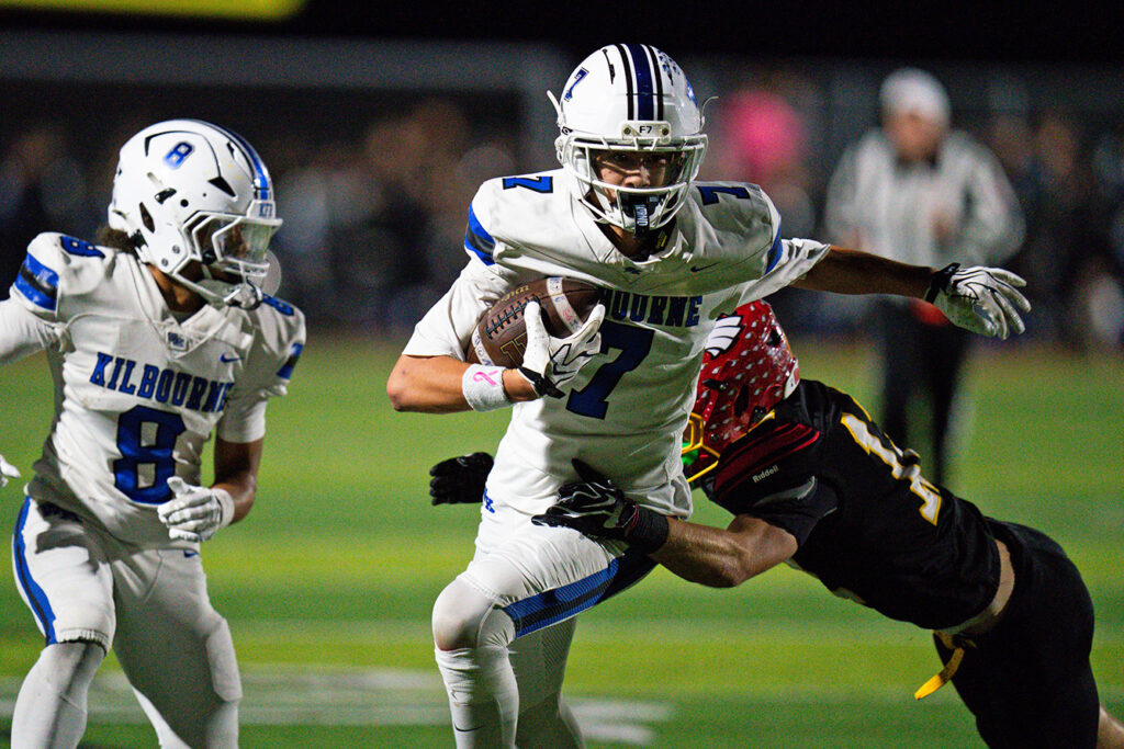 Kilbourne's Alex Meek runs after catch