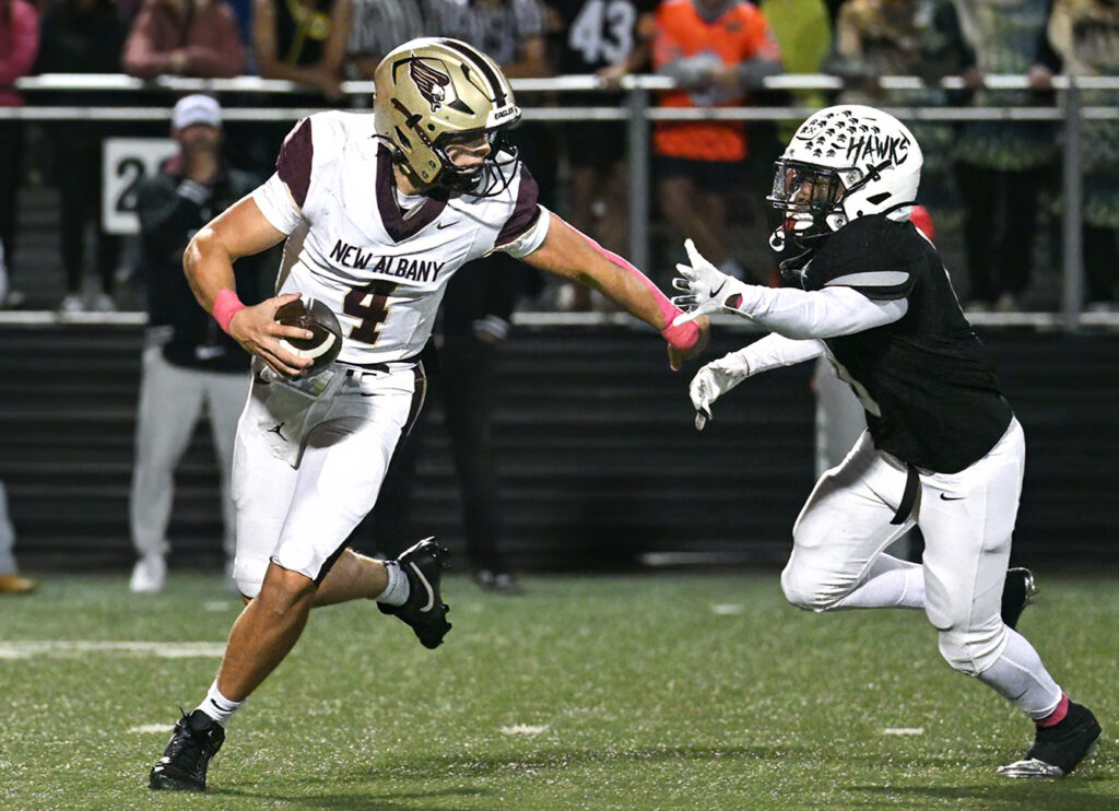 New Albany's Drew Jackson eludes rush