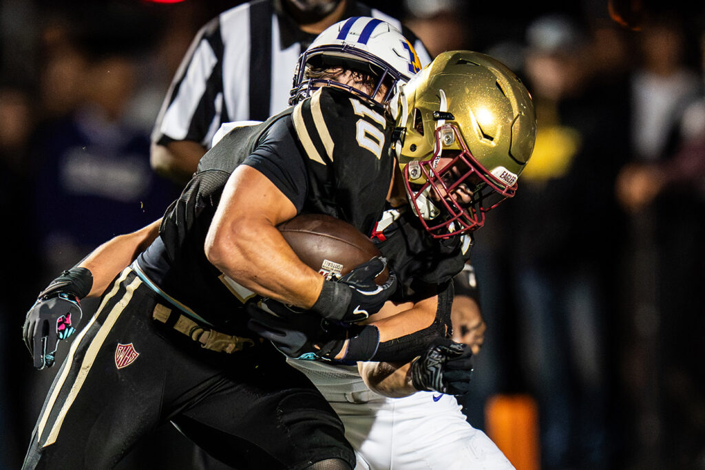 Watterson's Ben Uhlenhake runs ball