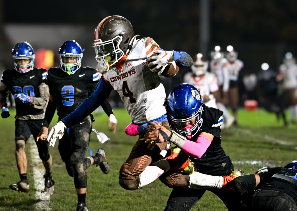 West's Bradley Binion carries ball