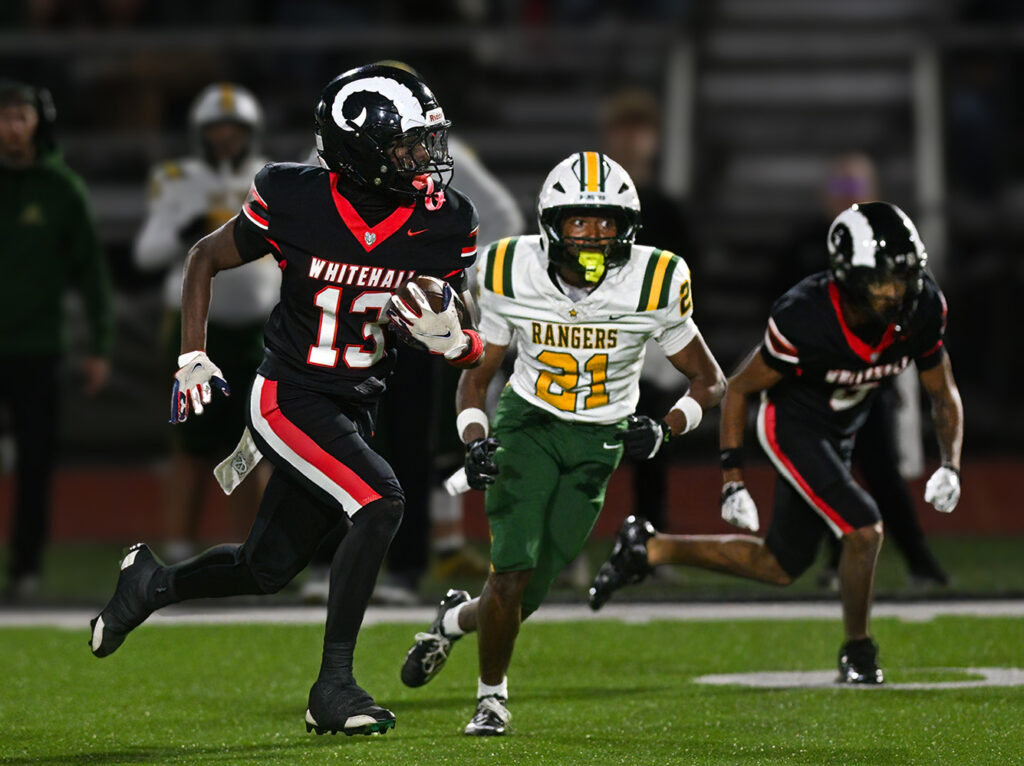 Whitehall's Jaiden Brown runs after catch