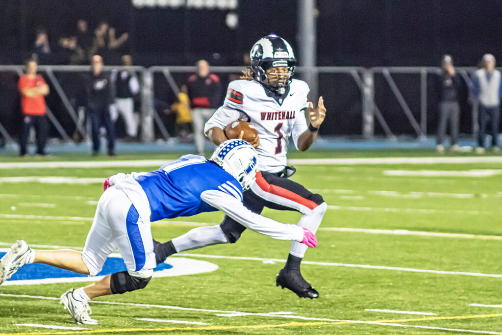 Whitehall's Malachi Jackson runs wide
